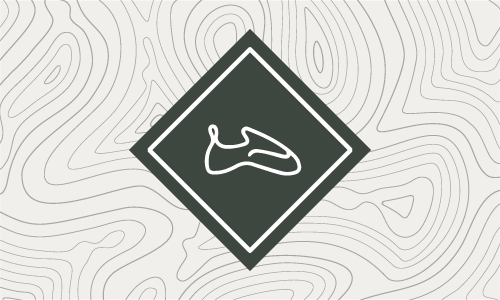 Icon of climbing shoes on contour lines