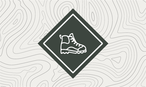 Icon of a walking Boot on contour lines