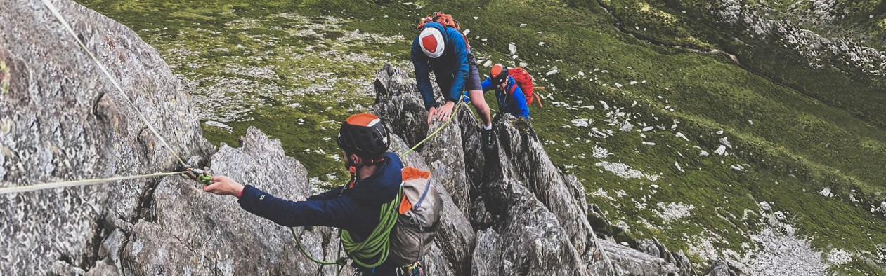A mountaineering company in North Wales taking to Clients up Cneifion Arete in Eryri/Snowdonia National Park.