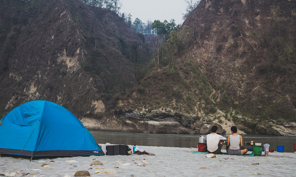 Tent at the side of a river in Nepal